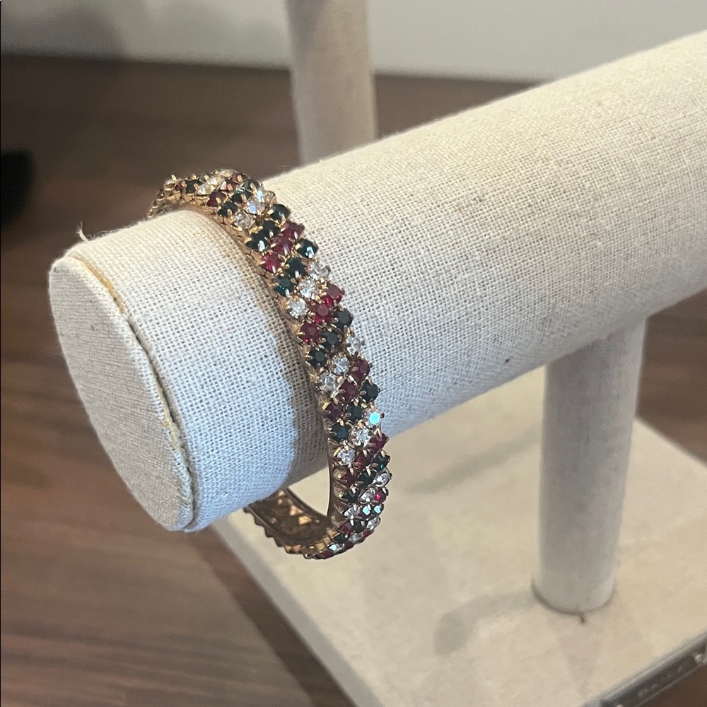 Vintage bangle bracelet with red, clear and green rhinestones